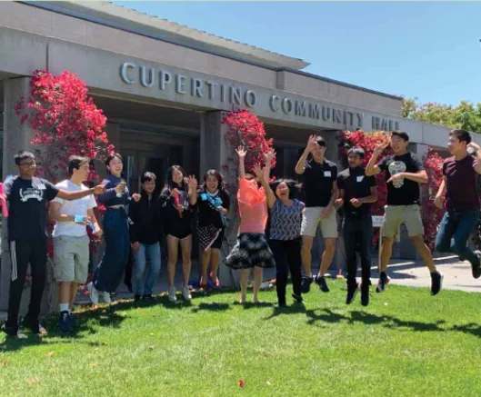 Young people and community members gathered outside Cupertino Community Hall