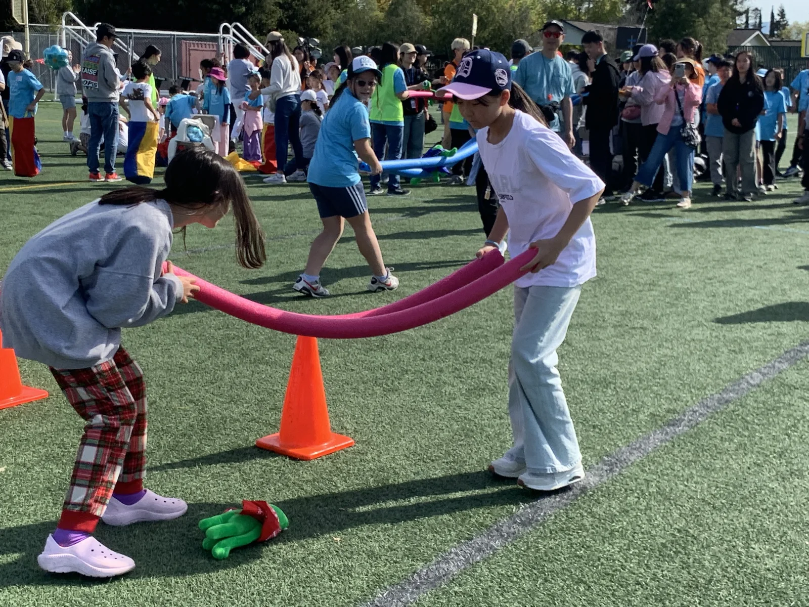 Young people participating in a team activity on an athletic field